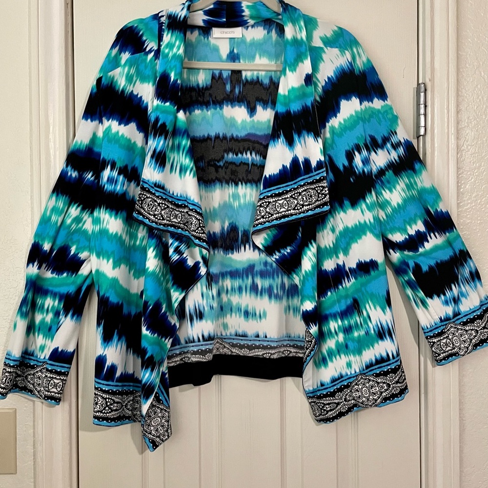 Chico’s size 3 Ladies Swing Jacket. Blues, Black, Green, White. Great shape.